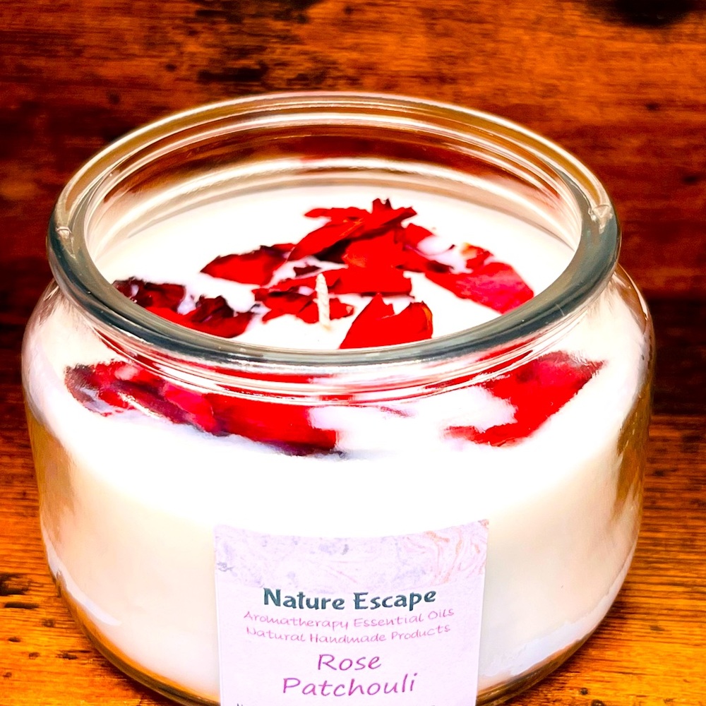 Natural soy wax hand poured with patchouli fragrance and rose petals. 10 oz